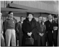 Secretary of Labor Frances Perkins with Lockheed Aircraft Corporation apprentice and officials, Los Angeles, 1940