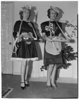 Clubwomen Mrs. Charles R. Smith and Mrs. Leon Kassob dressed up for Valentine's Day, Los Angeles, 1940s