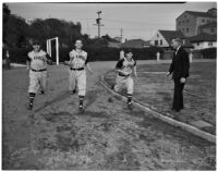 Dean Cromwell coaching new players on the Los Angeles Angels baseball team, Los Angeles, 1940