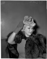 Mae West in court during questioning about earnings from her role in the movie "She Done Him Wrong," Los Angeles, 1940