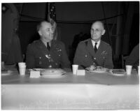 Lieut. Gen. John L. DeWitt and Col. Rush B. Lindon eating dinner at a military banquet at the National Guard Armory, Los Angeles, 1940