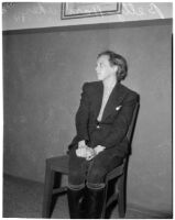 Betty Hardaker, mother convicted of murdering her daughter, sits in jail after being taken into custody, Los Angeles, 1940