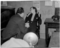 Betty Hardaker, mother convicted of murdering her daughter, during questioning by Dr. Paul De River, Los Angeles, 1940