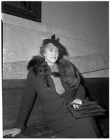 Lurine Spreckels Kuzrick sitting on a bench wearing a mink stole, Los Angeles