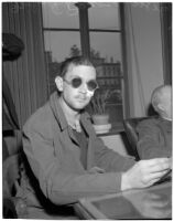 John Frank Reavis awaiting the decision on his indictment for the murder of Alice "Jerry" Burns, Los Angeles, February 28, 1940