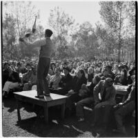 Juggler Val Setz entertains the crowd at Anaheim's annual Halloween festival, Anaheim, October 31, 1946