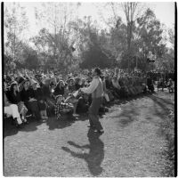 Juggler Val Setz entertains the crowd at Anaheim's annual Halloween festival, Anaheim, October 31, 1946