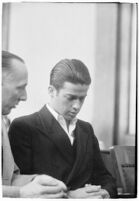 Louis Rude Payne and Dist. Atty. Buron Fitts at Payne's inquest for the murder of his mother and younger brother, Los Angeles, June 6, 1934