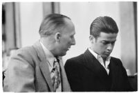 Louis Rude Payne and Dist. Atty. Buron Fitts at Payne's inquest for the murder of his mother and younger brother, Los Angeles, June 6, 1934