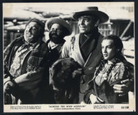 Adolphe Menjou, Henri Letondal, Clark Gable, and Maria Elena Marques in Across the Wide Missouri