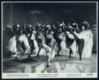 Gene Kelly and other cast members in An American in Paris