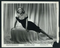Marilyn Monroe poses on the set of The Asphalt Jungle