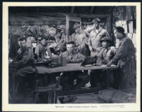Cast members in a scene from Bataan