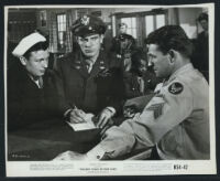 Harold Russell, Dana Andrews, and other cast members in The Best Years of Our Lives