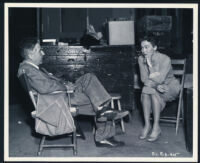 Curtis Bernhardt and Jane Wyman on the set of The Blue Veil