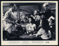 Wendell Corey, Mickey Rooney, and other cast members in The Bold and the Brave