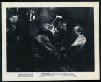 Phyllis Calvert and other actors in a scene from Broken Journey