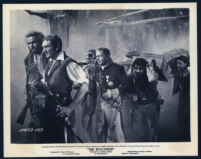 Mickey Finn, Yul Brynner, Charles Boyer, and other cast members in The Buccaneer