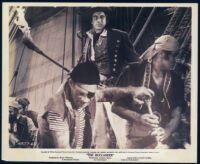 Robert F. Simon and cast members in a scene from The Buccaneer