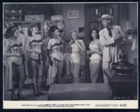 Dennis O'Keefe, Patricia Medina, and other cast members in Drums of Tahiti