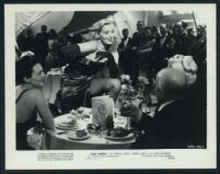Greta Gynt entertains a table in Easy Money
