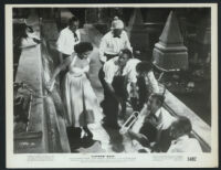 Elizabeth Taylor and unidentified cast members in Elephant Walk
