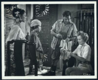 Barbara Stanwyck, Lisa Montell, and Robert Ryan in Escape to Burma