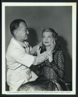 Betty Field with makeup artist Jack Pierce on the set of Flesh and Fantasy.