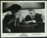 Geneviève Page and Robert Mitchum in Foreign Intrigue