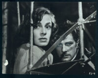 Viveca Lindfors and Hans Putz in a scene from Four in a Jeep