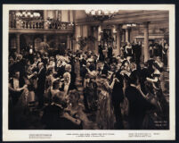 Cast members and extras dancing in the county ball scene from Hatter's Castle