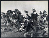 Cast members in a scene from Khartoum.