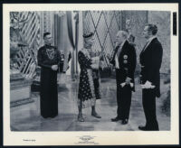 Yul Brynner, Martin Benson, Alan Mowbray, and Geoffrey Toone in The King and I