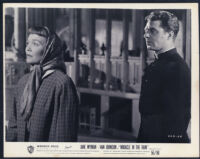 Jane Wyman and Paul Picerni in Miracle In The Rain