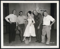 Ann Blyth and studio technicians between scenes in Sally and Saint Anne