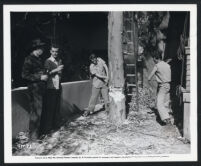 Cast members in a scene from Sally and Saint Anne
