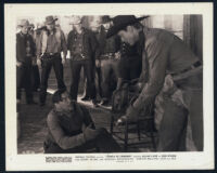 Allan Lane, Dick Curtis and extras in a scene from Santa Fe Uprising