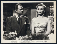 Actors in a scene from The Scarlet Hour