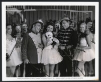Ole Olsen, Grace McDonald, Chic Johnson and extras in a scene from See My Lawyer