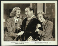 Lloyd Corrigan, Anita Louise and Terry Moore [credited as Helen Koford] in a scene from Shadowed