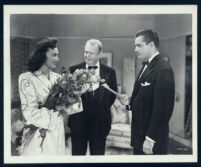 Ginny Simms, Charles Coburn and Robert Paige in a scene from Shady Lady