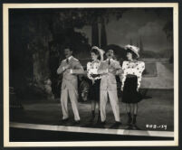 George Murphy, Constance Moore, Eddie Cantor and Joan Davis in a scene from Show Business