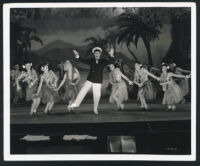 George Murphy and chorus in a scene from Show Business