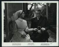 Rosalind Russell and Dean Jagger in Sister Kenny