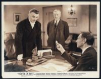 George Brent, Gilbert Emery, and James Stephenson in South Of Suez