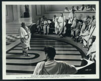 Charles Laughton, John Gavin, Dayton Lummis and extras in a scene from Spartacus