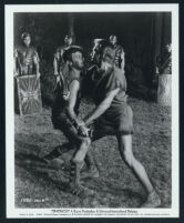 Kirk Douglas and Tony Curtis fight in a scene from Spartacus