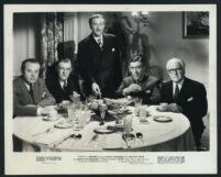 Leo G. Carroll, John Emery and other unidentified actors in a scene from Spellbound