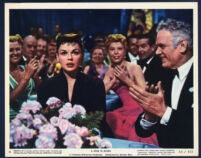 Judy Garland, Charles Bickford, and extras in A Star Is Born