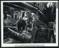 Oliver Thorndike and Gary Cooper in The Story Of Dr. Wassell